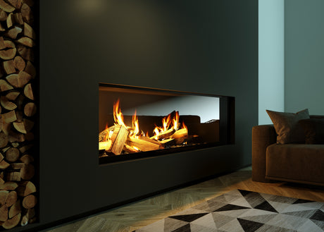 Modern living room with a built-in linear gas fireplace, stacked firewood, and cozy seating.